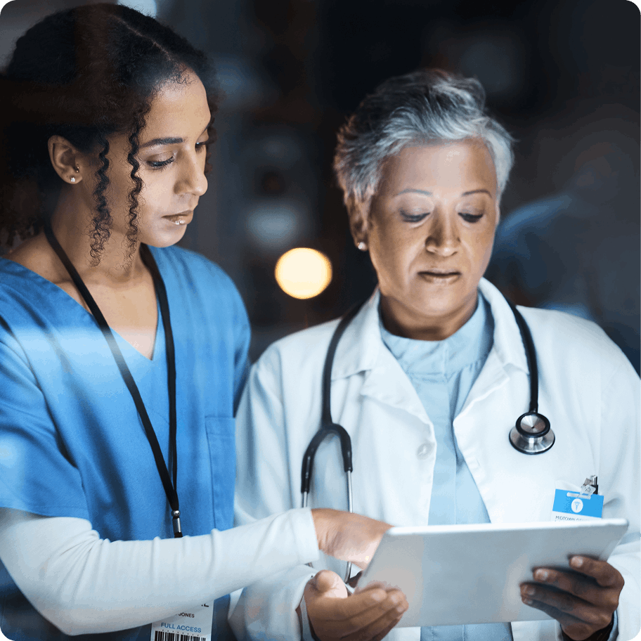 Doctor-and-nurse-looking-at-report