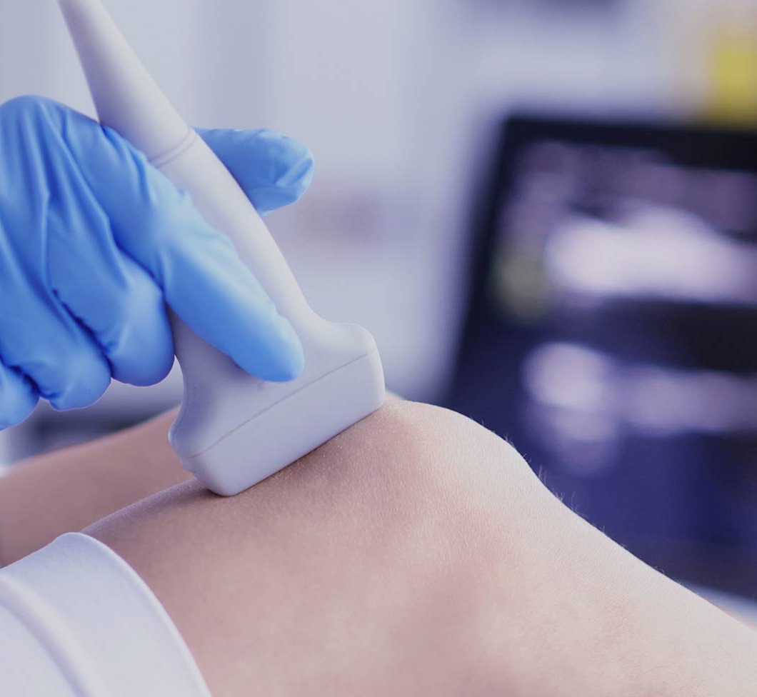 doctor scanning knee