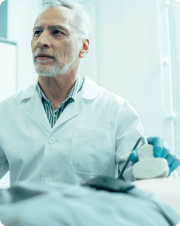 male doctor scanning patient