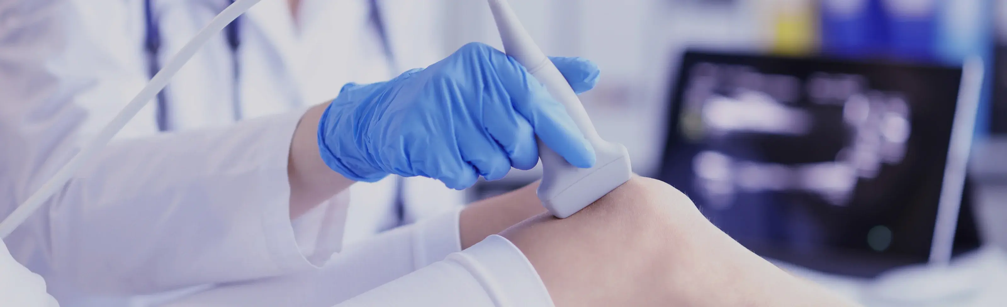 doctor scanning knee